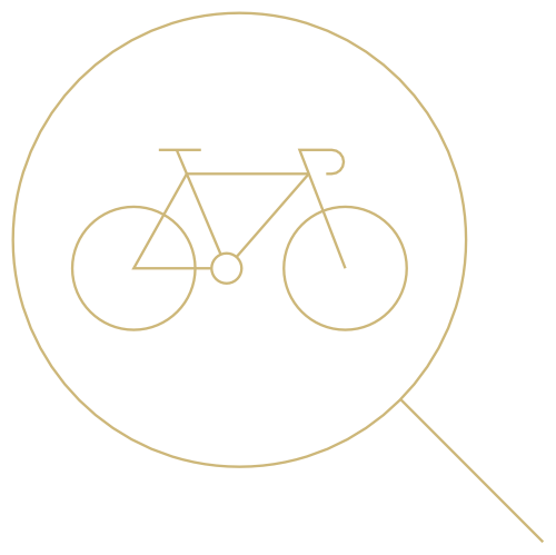 A minimalist image featuring a magnifying glass icon with a simple line drawing of a bicycle inside the lens, all outlined in gold against a black background, perfectly symbolizing our "About Us" section's focus on discovery and precision.