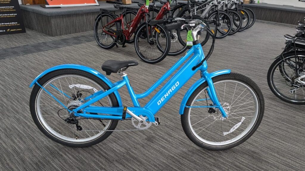 Blue Denago bike in a showroom