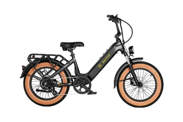 Black electric bike with tan tires.