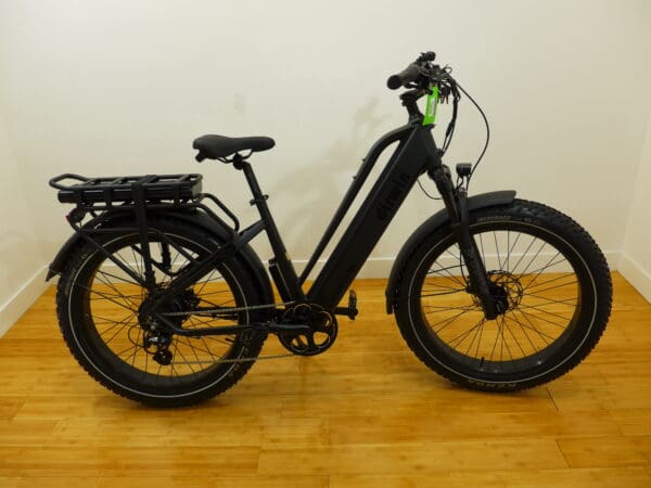 Black electric bicycle with fat tires.