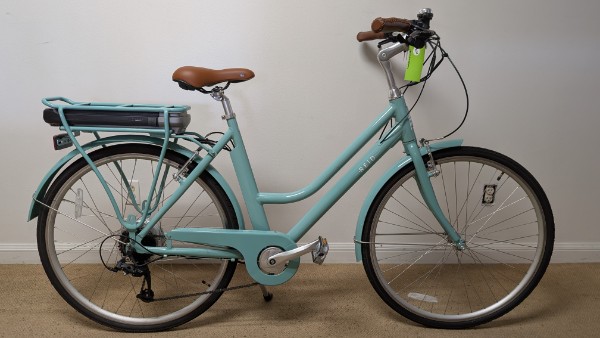 Blue electric bike with brown seat and handlebars.