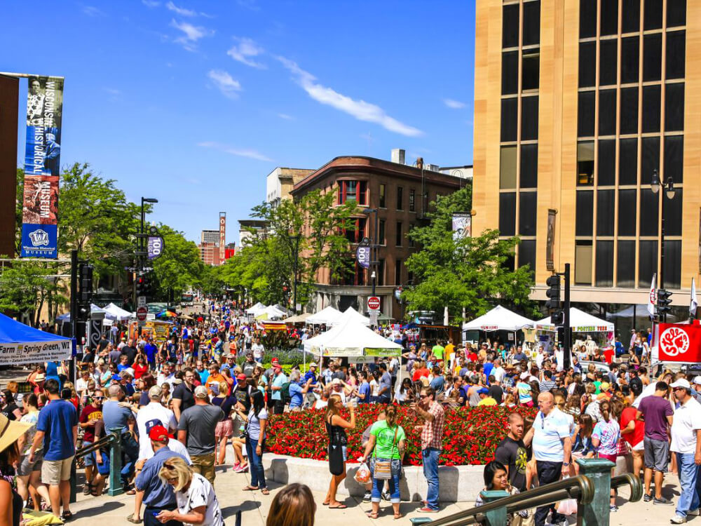 Crowded outdoor market on a sunny day.