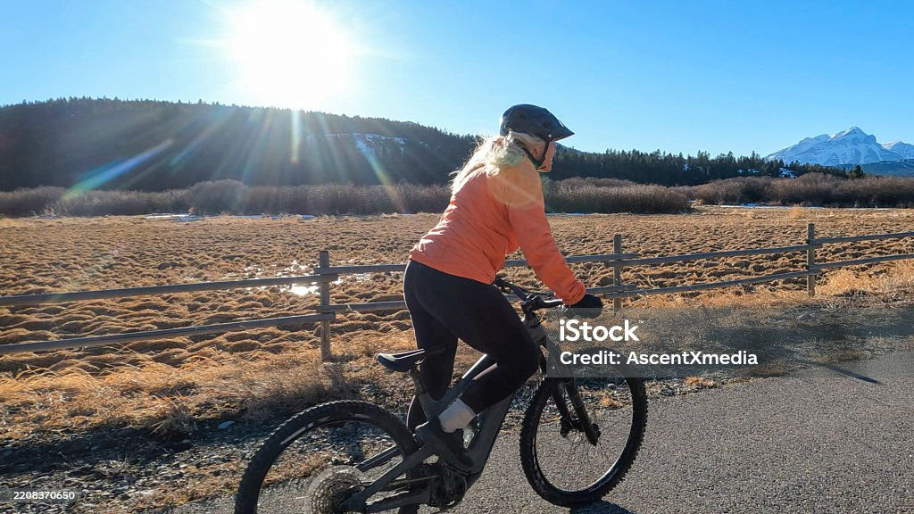 Cyclist on a sunny rural road