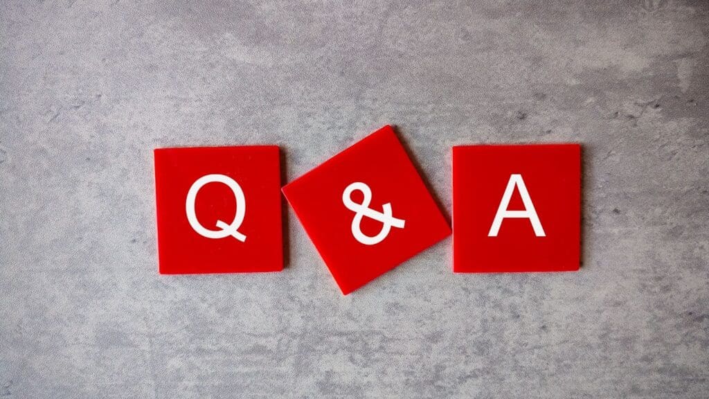 Red Q&A tiles on gray background