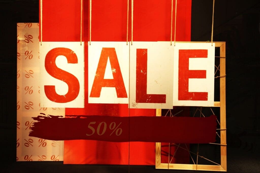 Large red SALE sign with 50% discount