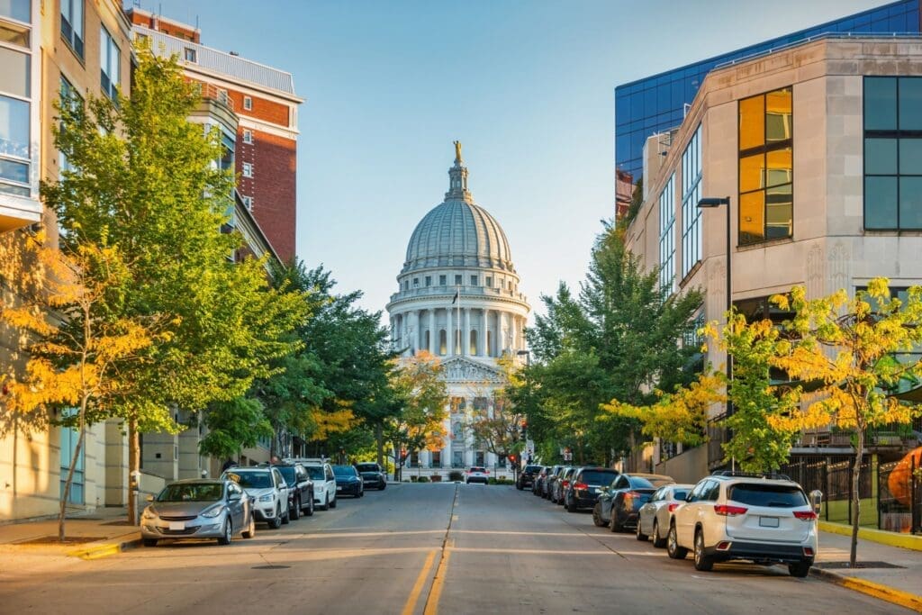State capitol dome at end of city street