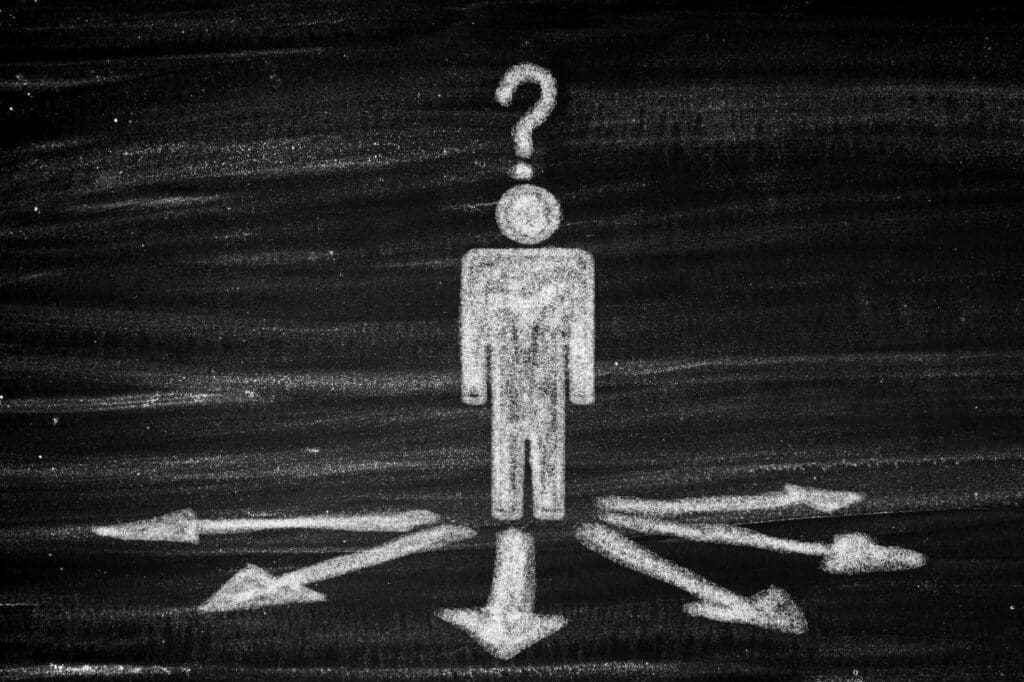 Chalk figure with question mark and directional arrows