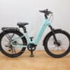 Velotric - Discover 3 - Mint - 1 Profile Light teal Velotric electric bike with rear rack