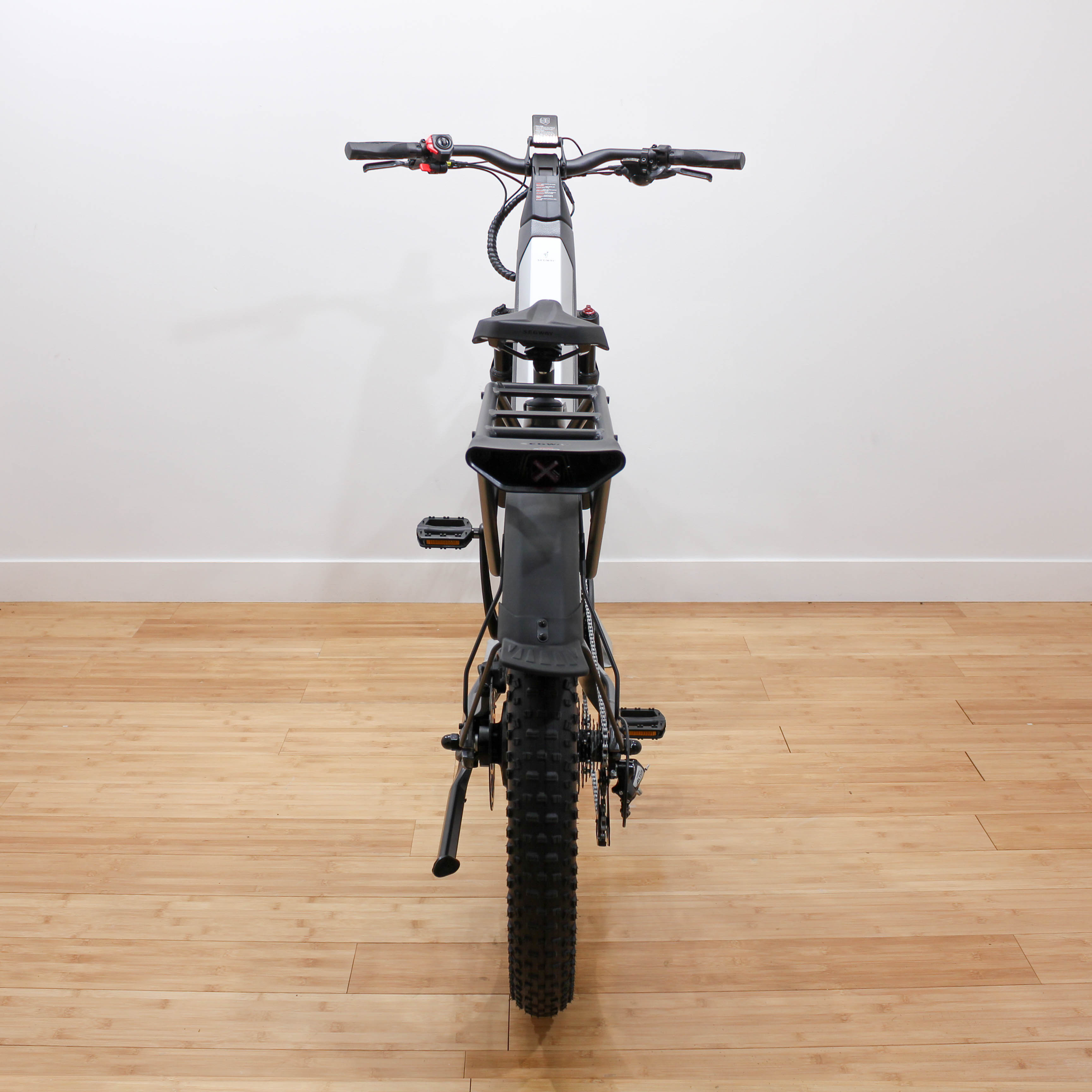 Front view of fat-tire electric bike indoors